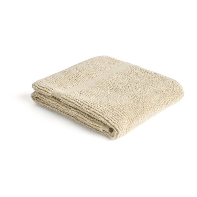 Niska cena Beżowy bawełniany ręcznik frotte 50x90 cm Olvira – Kave Home Bonami